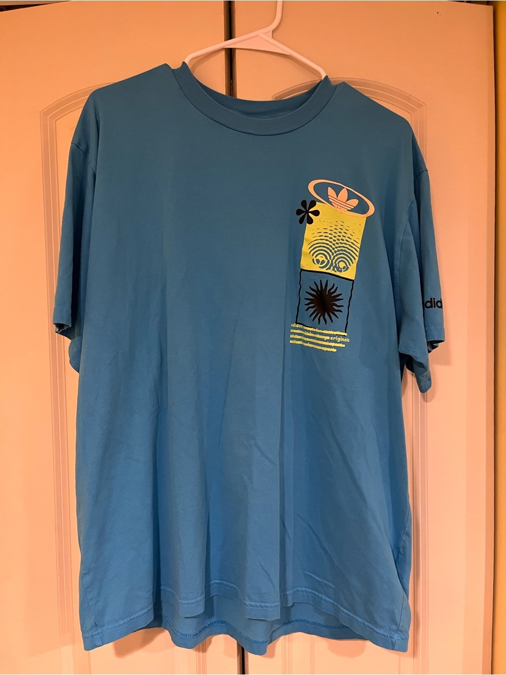 adidas Men’s Teal Blue Short-Sleeve Graphic Tee with Yellow Accent